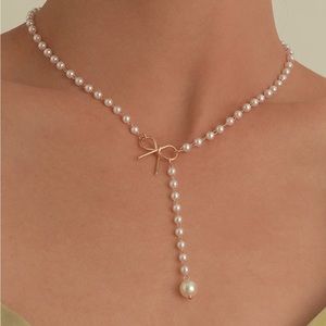 SHEIN pearl and bow necklace